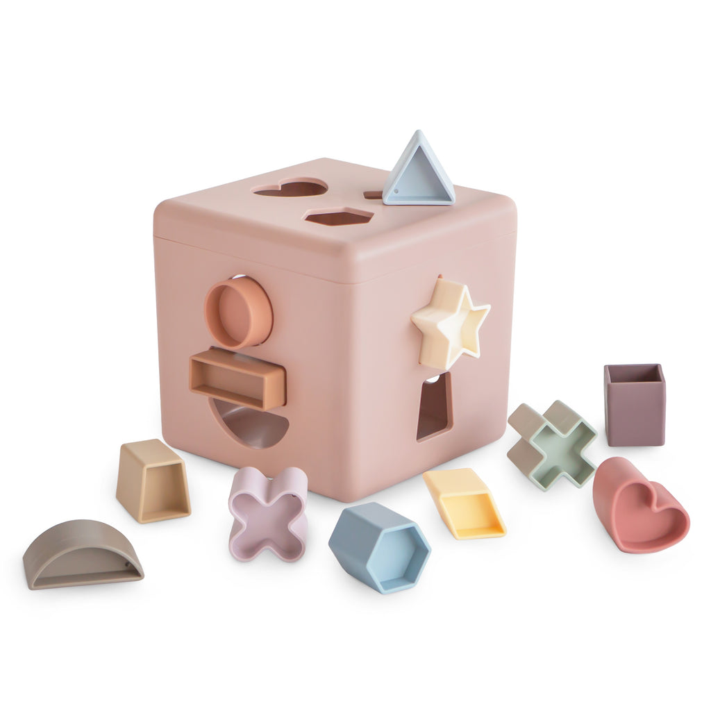 Mushie vormenstoof pastel pink 10 mnd+